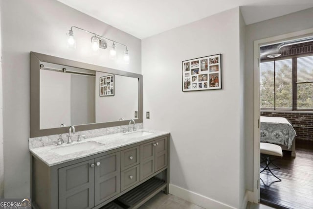 bathroom featuring tile patterned floors and vanity