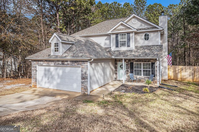 front facade with a garage