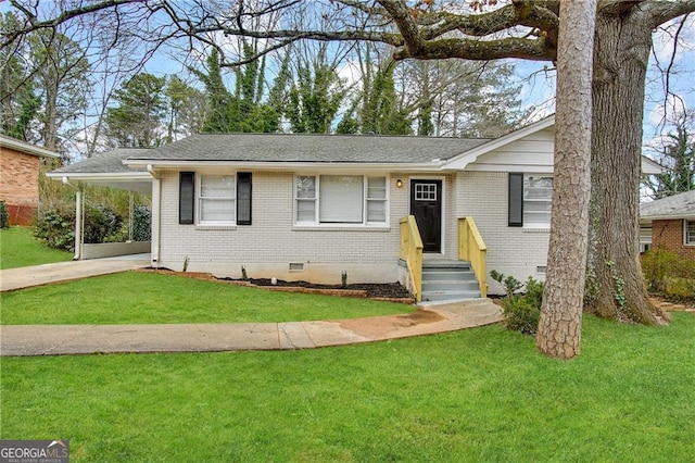 ranch-style house featuring a carport and a front lawn