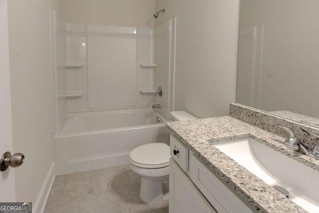 full bathroom featuring toilet, washtub / shower combination, tile patterned floors, and vanity