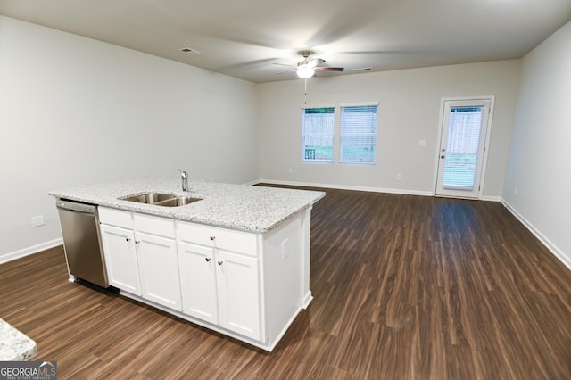 kitchen with light stone counters, dishwasher, white cabinets, ceiling fan, and sink