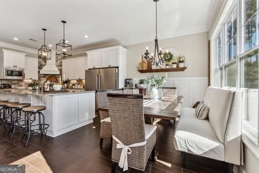 dining room featuring dark wood-type flooring