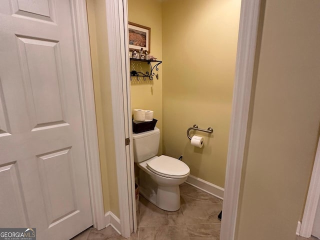 bathroom featuring toilet