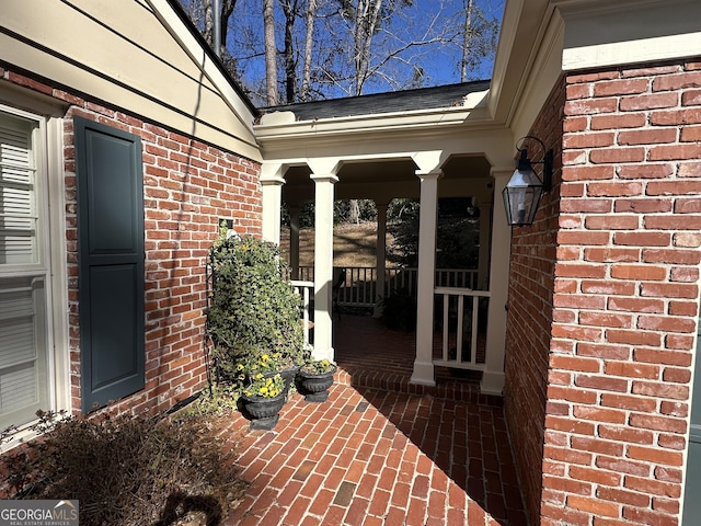 view of patio featuring a porch