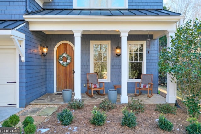 property entrance with covered porch