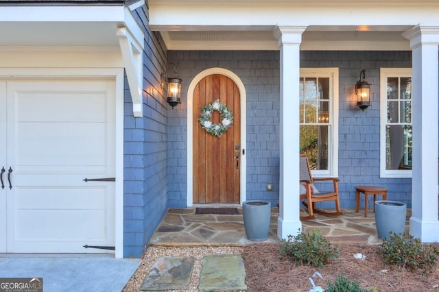 entrance to property with a porch