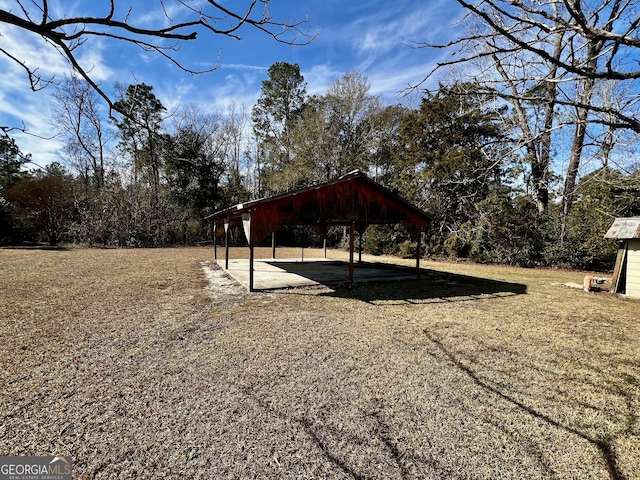 view of yard featuring a carport