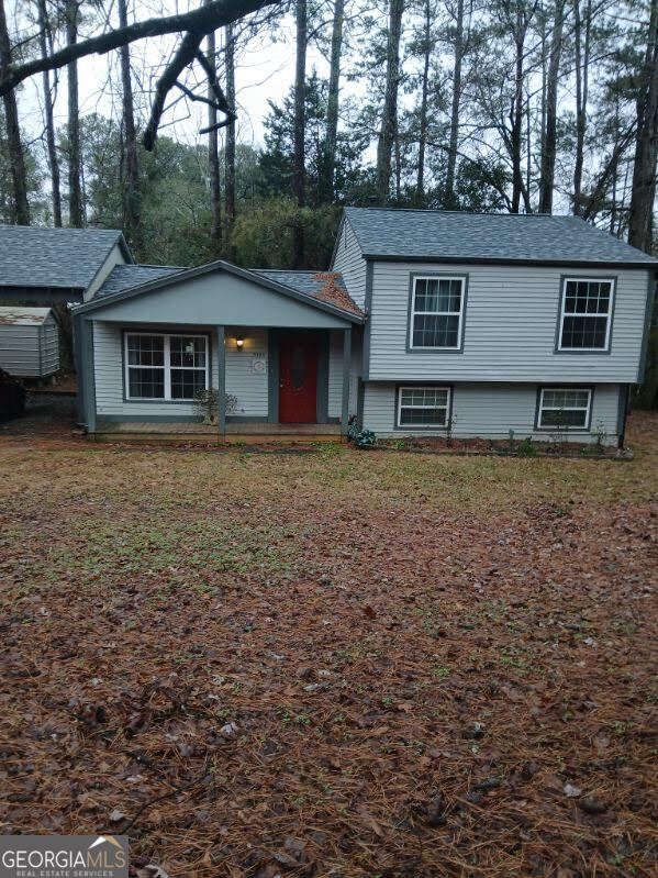 tri-level home featuring a porch