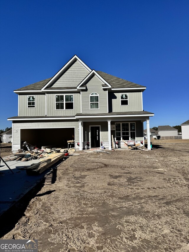 property under construction featuring a garage