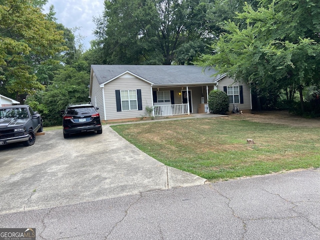 single story home featuring a front yard and a porch