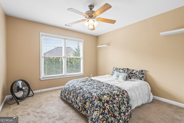 carpeted bedroom featuring ceiling fan