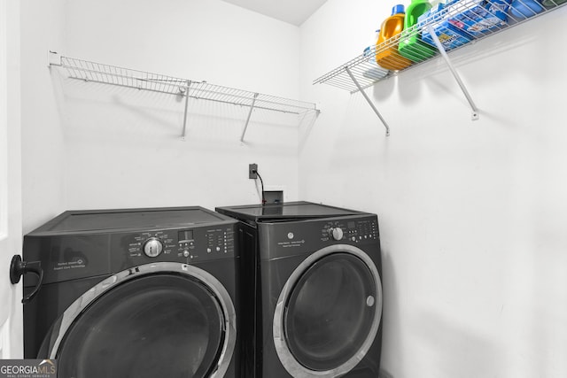 laundry room featuring washer and dryer