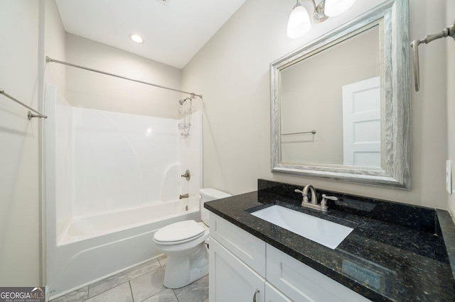 full bathroom featuring shower / bathing tub combination, tile patterned floors, vanity, and toilet