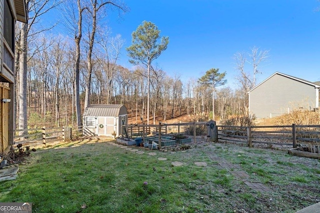 view of yard with a storage unit