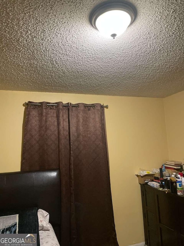 bathroom with a textured ceiling