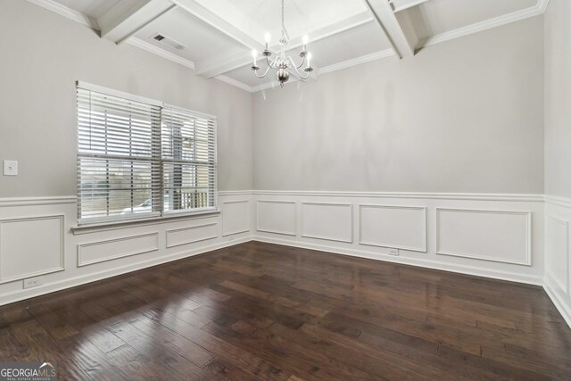 empty room with coffered ceiling, an inviting chandelier, hardwood / wood-style floors, and beamed ceiling