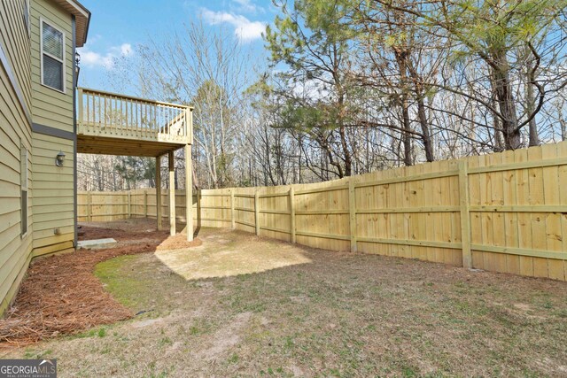 view of yard featuring a deck