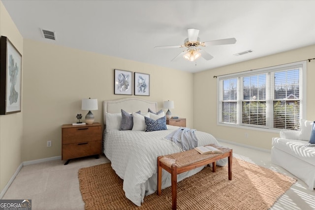 bedroom featuring ceiling fan and light colored carpet