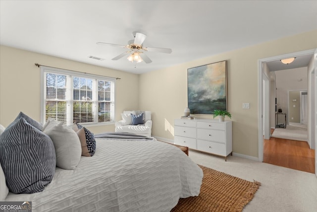 carpeted bedroom featuring ceiling fan