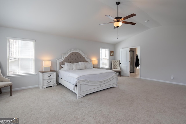 bedroom featuring ceiling fan, light colored carpet, and lofted ceiling