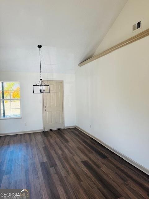 interior space with lofted ceiling and dark hardwood / wood-style floors