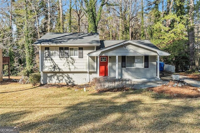 split level home featuring a porch and a front yard