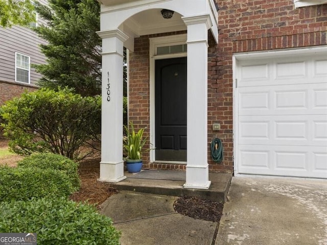 entrance to property with a garage