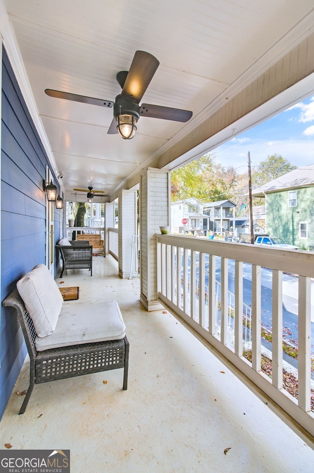 view of patio featuring covered porch and ceiling fan