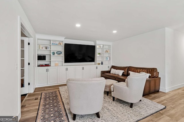 living room with light hardwood / wood-style floors