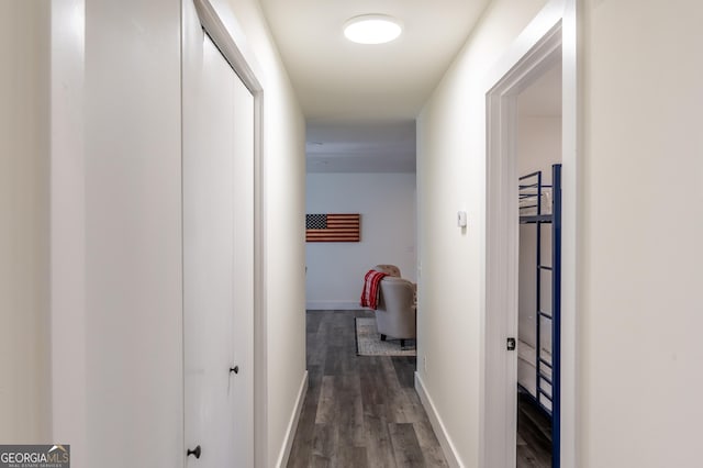 corridor featuring dark hardwood / wood-style flooring