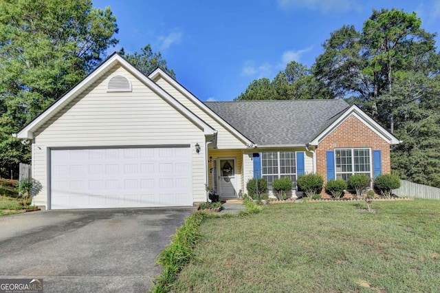 ranch-style house with a front yard and a garage