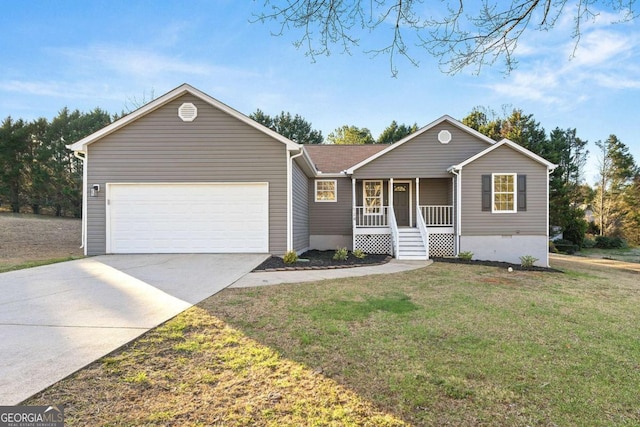 single story home with covered porch, a front lawn, and a garage