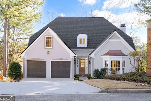 view of front of property with a garage