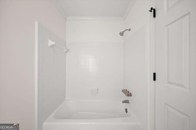 bathroom with shower / tub combination and crown molding