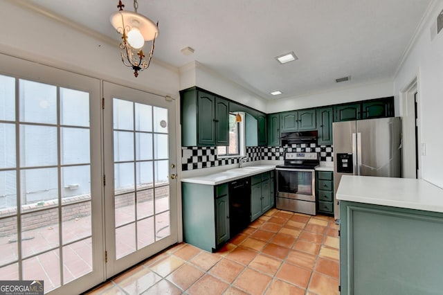 kitchen featuring green cabinets, stainless steel appliances, tasteful backsplash, light tile patterned flooring, and sink