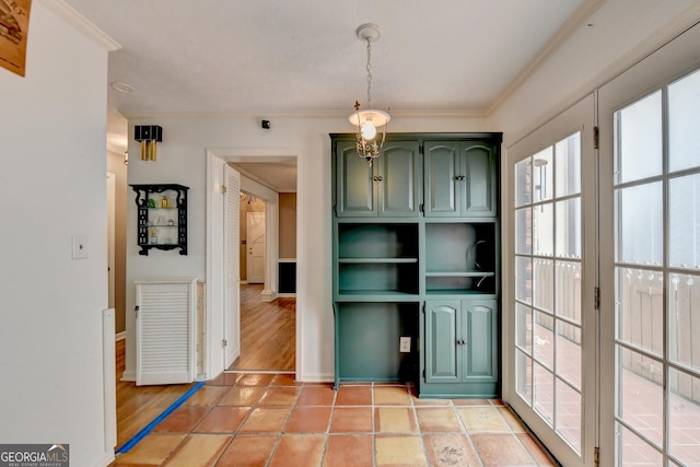 interior space featuring ornamental molding and light tile patterned floors