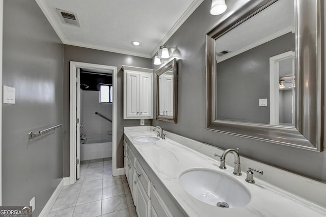 bathroom featuring a textured ceiling, tile patterned floors, shower / bathtub combination, vanity, and crown molding