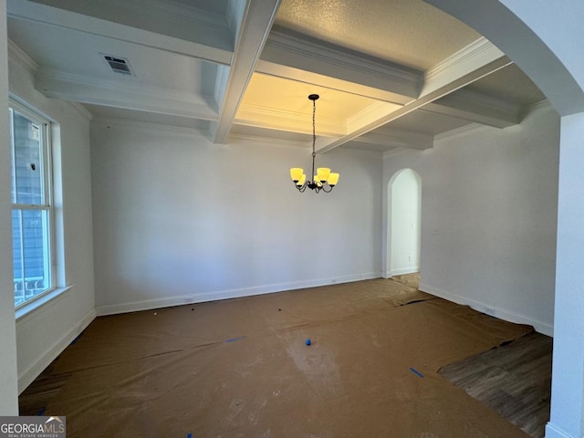 unfurnished dining area featuring beam ceiling, a notable chandelier, and coffered ceiling