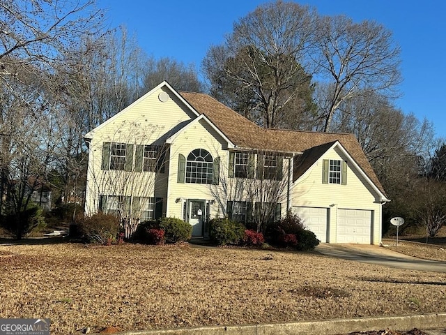 front of property featuring a garage