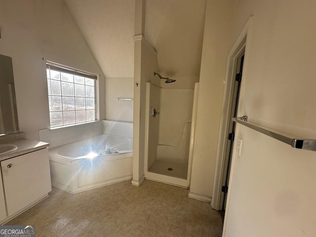 bathroom with lofted ceiling, shower with separate bathtub, and vanity