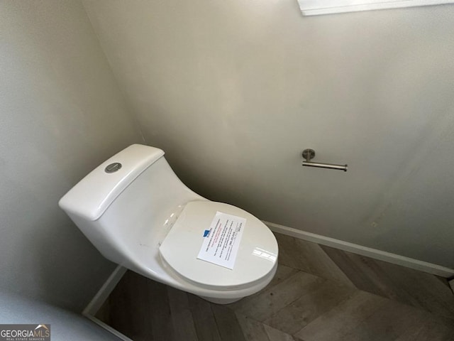 bathroom featuring toilet