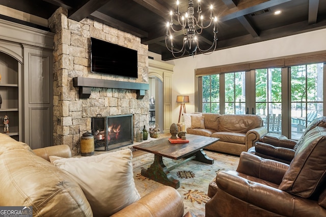 4874 Kettle River Pt, Suwanee, GA 30024 - living area with beamed ceiling, a fireplace, visible vents, and an inviting chandelier