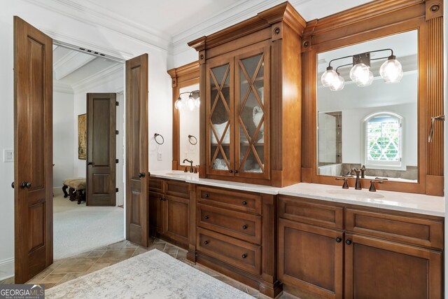 bathroom featuring vanity and ornamental molding