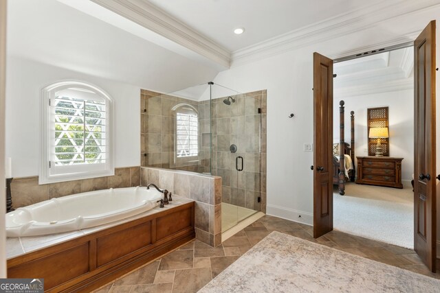 bathroom with independent shower and bath and crown molding