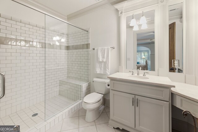 bathroom with toilet, walk in shower, tile patterned floors, vanity, and crown molding