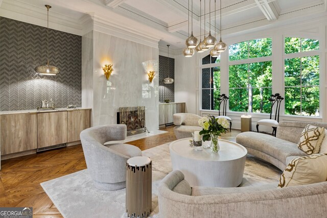 living room featuring coffered ceiling, beam ceiling, crown molding, and parquet floors