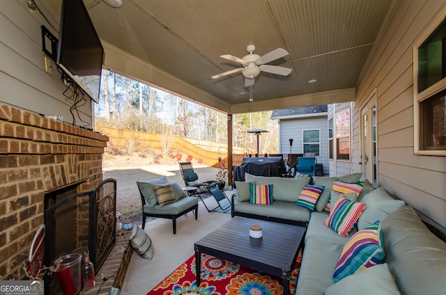 view of patio / terrace with an outdoor hangout area, ceiling fan, and area for grilling