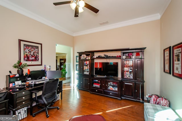 home office featuring ceiling fan, hardwood / wood-style flooring, and crown molding