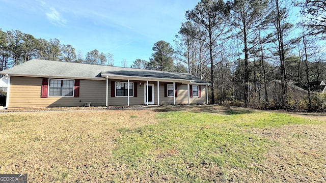 single story home with a front yard