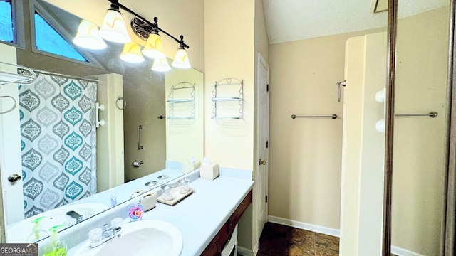 bathroom featuring a shower with shower curtain and vanity